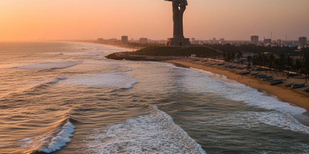 Dakar's Atlantic coastline with the African Renaissance Monument rising above the headland